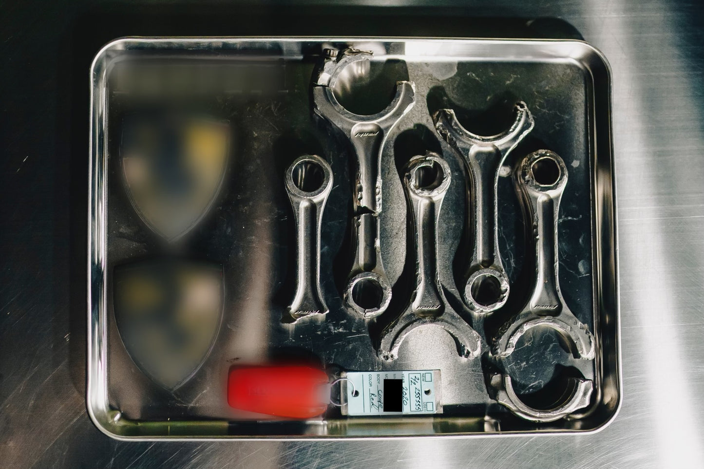 PIECES OF A FAST RED ITALIAN SUPERCAR